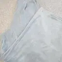 베이비 스카이블루 색상입니다. 아이보리 퍼 베스트에 입