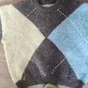 털이 빠져서 진한옷에는 못 입을거 같아요 디자인은 예쁘