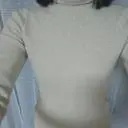  네이비 자켓안에 입으려고 샀는데 펄이 들어가있어서 더