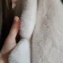 굉장히 두툼하구 귀여워요 가볍구요. 뽀송뽀송한 느낌의 