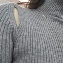 유니크한 무드가 돋보이는 트임 하이넥 골지 니트 폴라 