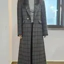 고급스럽고 클래식한 무드의 울 혼방 체크 롱 코트 상품